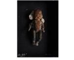 Doll, oyster shells, paint, on linen  10in. x 13in.,  1993