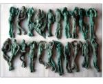 Plaster cast, paint, Bavarian green earth. 12 in. x 96 in. 1985.